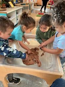 cdc children playing with clay