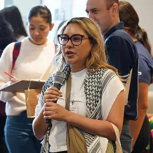 Student speaking at event