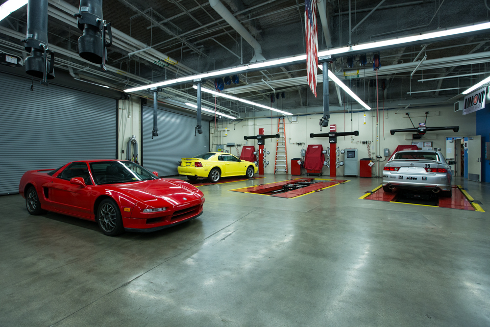 Wide-angle view of Río Hondo Community College’s automotive facility, featuring tools, cars, and diagnostic stations