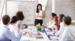 Group of business people in conference room.